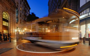 a streetcar turning at Powell Station near Market Street