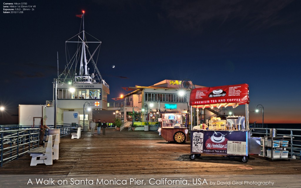 Harbour Office, Mariasol Restaurant and stores on Santa Monica Pier at the blue hour, California by David Giral
